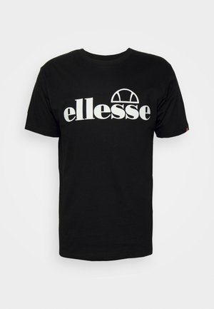 Must värviga puuvillane T-särk lühikeste varrukatega ja ümmarguse kaelusega. Omab suurt valget "ellesse" logo ning kõverat graafikat teksti kohal.