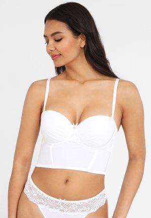 White lingerie set featuring a structured bustier with lace accents, thin straps, and a decorative bow at the center. Soft, smooth material.