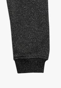 Molo ALIKI - Träningsbyxor - silver/black