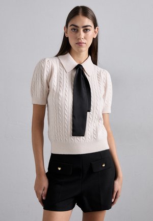 - Koszulka polo