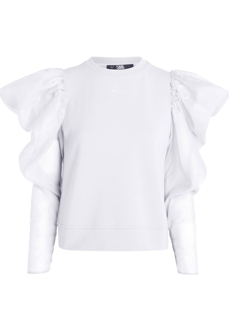 Camiseta blanca de manga larga con mangas de organza abullonadas y sutil bordado "Karl" en el pecho, con un escote redondo.