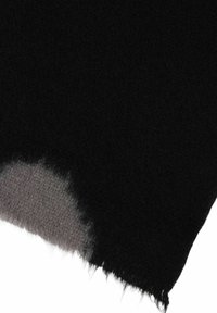 Black fabric with a soft, fuzzy texture, featuring a frayed edge. The bottom edge transitions to a gray woven texture.