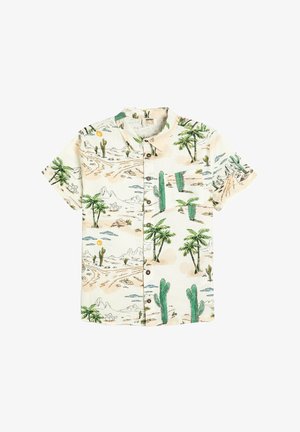 Camisa de botones de manga corta en tejido crema con un estampado de paisaje desértico que presenta cactus, palmeras y montañas en tonos verdes y marrones.
