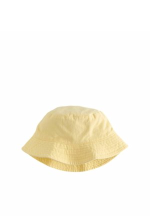 Gelber Baumwolle-Bucket-Hut mit breiter, schlaffer Krempe und leicht strukturierter Oberfläche. Nahtdetails betonen die abgerundete Krone.