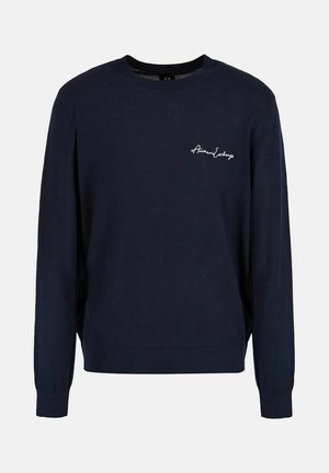 Felpa girocollo in cotone blu navy con maniche lunghe. Presenta un piccolo logo ricamato bianco sul petto. Tessuto morbido e vestibilità rilassata.