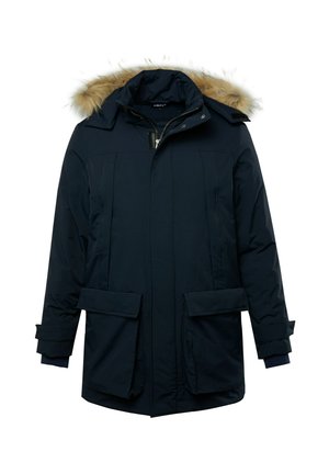 Tummansininen eristetty parka, jossa on tekoturkista vuorattu huppu, kaksi isoa etutaskua ja säädettävät hihat. Sujuva pinta ja vetoketjukiinnitys.