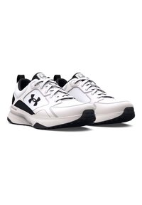 Zapatillas deportivas blancas con acentos negros, puntera redondeada, cuello acolchado y cordones. Presentan paneles texturizados y una suela gruesa y acolchada.