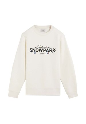 Sudadera de color crema con mangas largas, que presenta un logo gráfico "Snowpark" en negro y detalles coloridos con temática de esquí en el frente.