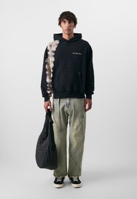 Don't Waste Culture MACAU UNISEX - Traperice opuštenog kroja - acid pale