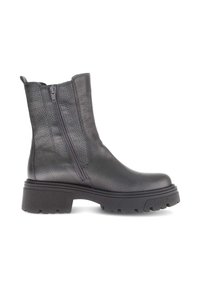 Black leather ankle boot with a textured finish, side zippers, and a chunky black rubber sole featuring treaded detailing.