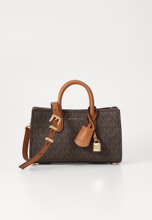 Sac à main Michael Kors marron et beige avec motif monogramme, deux anses, bandoulière ajustable, serrure et breloque logo dorés.