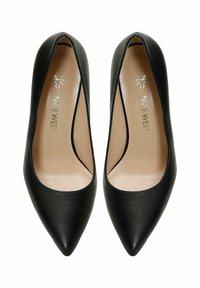 Black leather high-heeled pumps with a pointed toe and smooth texture. Interior features a beige insole with brand label.