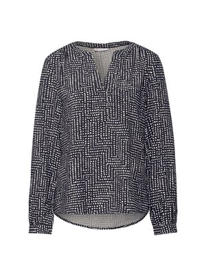 Marineblouse met een V-hals, voorzien van een geometrisch patroon van witte stippen, lange mouwen met gathering aan de manchetten en een afgeronde zoom.