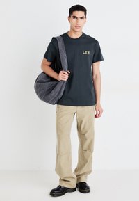 Lee Reisitaskuhousut - kansas city khaki