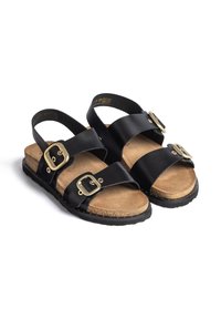 Sandales en cuir noir avec deux boucles dorées sur chaque bride, semelles intérieures rembourrées couleur fauve et semelles extérieures noires texturées.