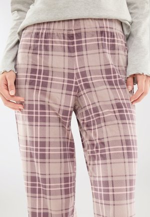 Pantaloni lounge a quadri in tessuto morbido, caratterizzati da una combinazione di tonalità marrone chiaro, malva e rosa pallido, con una vita elastica per maggiore comfort.