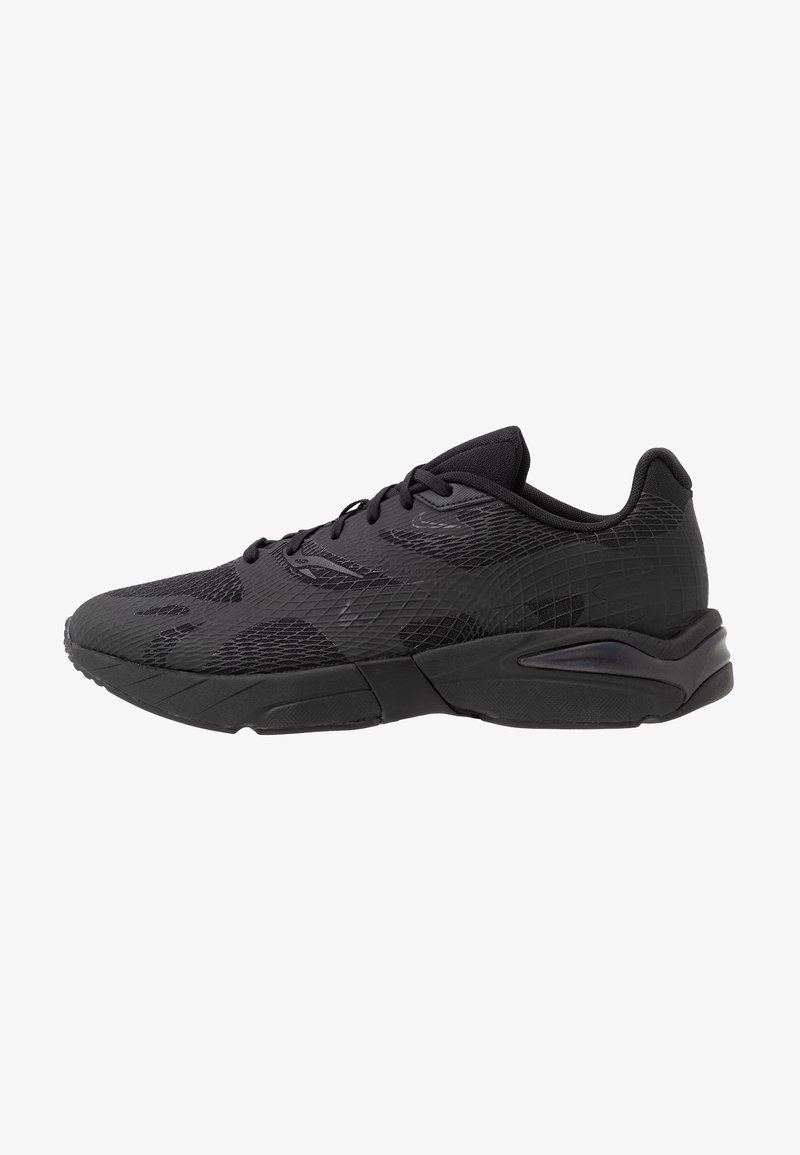 Black athletic shoes with a textured upper and smooth accents. Features a cushioned sole and lacing system for a secure fit.