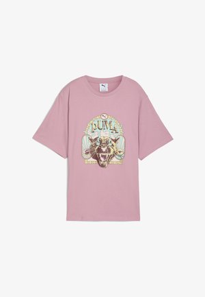 Pink short-sleeve t-shirt made of cotton, featuring a graphic of a roaring panther and “PUMA” text detailed in gold and green accents.