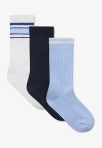 Three pairs of socks: white with blue stripes, solid dark navy, and light blue ribbed. Material is cotton blend, featuring a smooth texture.
