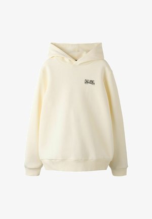 Krēmkrāsas sporta džemperis ar nelielu "Chamonix Sud Est France" logotipu kreisajā augšējā krūtīs, ar ribveida aprocēm un jostas vietu.