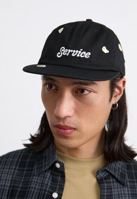SERVICE FRIED UNISEX - Lippalakki - black