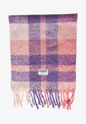 Gestreifte Decke aus weichem, strukturiertem Stoff in Rosa, Lila und Creme. Mit fransigen Kanten und einem Etikett in der Mitte versehen.