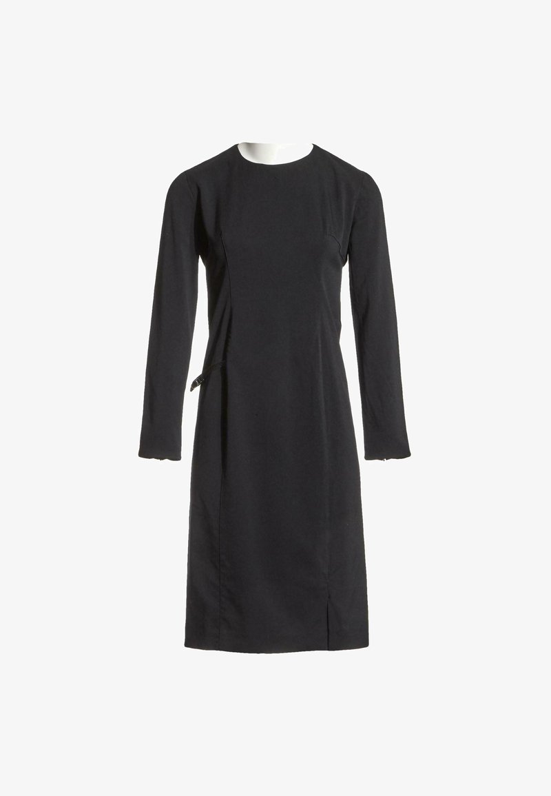 Robe noire à manches longues, longueur genoux, avec un col rond et une coupe slim, présentée sur un buste de mannequin blanc.