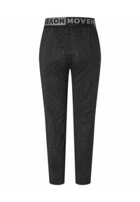 Smal passform svarta leggings med ett subtilt zigzag-mönster och ett svart elastiskt midjeband som har ordet "MOVEMENT" i fet stil med vita bokstäver.