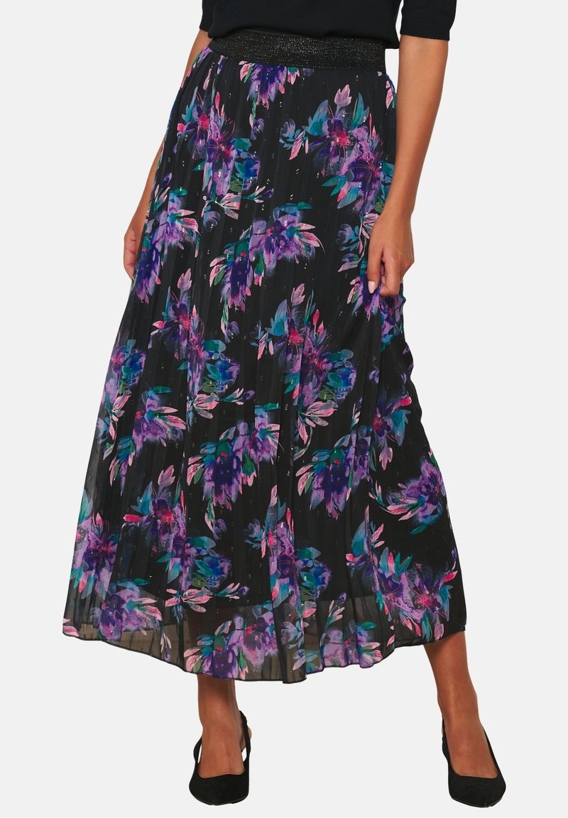 Black pleated maxi skirt with vibrant purple and teal floral print, featuring an elastic waistband and lightweight, flowing fabric.