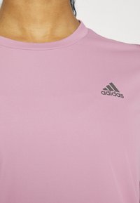 adidas Performance OWN THE RUN - Bluză cu mânecă lungă - wonde orchid