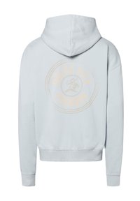 Felpa leggera azzurra con stampa grafica rotonda sul retro con "DOLCE VITA" e "PECADOR" in beige morbido. Realizzata in tessuto testurizzato.