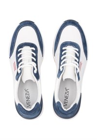 White and navy athletic shoes with a smooth leather upper, textured suede accents, white laces, and a rubber outsole. Red detailing near the seams.