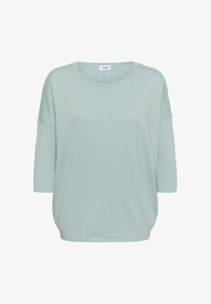 Light blue, short-sleeve sweater with a rounded neckline, soft knit texture, and a relaxed fit. Label reads "Saint."