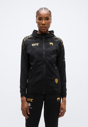 UFC ZENITH FIGHT NIGHT WOMENS - Training jacket - black/gold-coloured