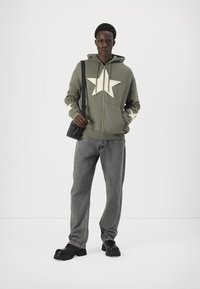 YOURTURN UNISEX - Jaka ar rāvējslēdzēju - khaki