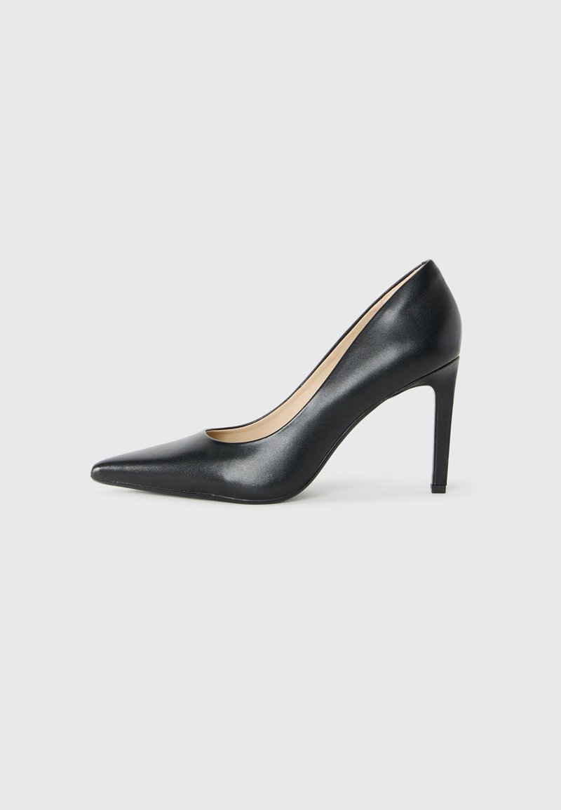 Black leather pointed-toe high heel shoe with a slim stiletto heel on a white background.