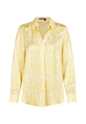 Long-sleeve yellow blouse with abstract light yellow and white pattern, pointed collar, and buttoned cuffs.