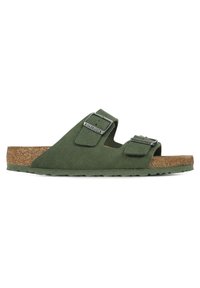 Green felt slide sandal with two adjustable straps and silver buckles, featuring a cork footbed and textured rubber outsole.