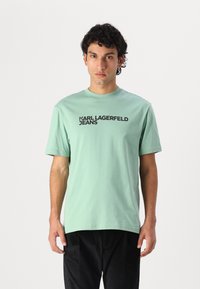 Karl Lagerfeld Jeans - ESSENTIAL TEE - T-shirt con stampa - light green Immagine in miniatura 1