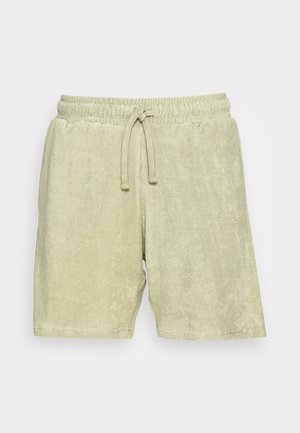 Lichtgroene badstof shorts met een elastische tailleband en trekkoord. Zachte textuur en knielange ontwerp. Geen zakken of extra hardware.