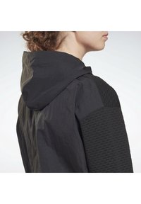 Reebok Felpa con cappuccio - black