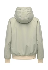 Lysegrå hettejakke med ribbet kremfargede mansjetter og midjebånd, vist bakfra mot en hvit bakgrunn.