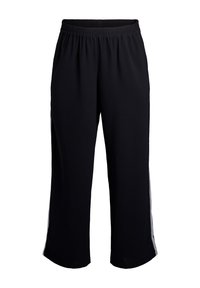 Čierne elastické teplákové nohavice s voľnými nohavicami a bielymi pruhmi na bokoch na bielom pozadí.