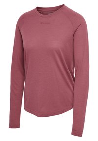 Pitkähihainen paita hillityssä ruusun sävyssä, valmistettu teksturoidusta kankaasta. Pyöristetty helma ja raglan-hihat, rinnassa logo.