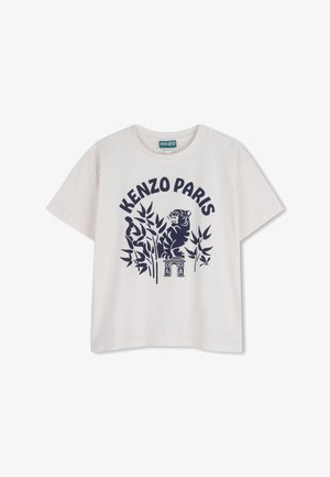 T-shirt blanc à manches courtes avec le texte "KENZO PARIS" en bleu marine, un graphisme de tigre et des illustrations de plantes sur le devant.