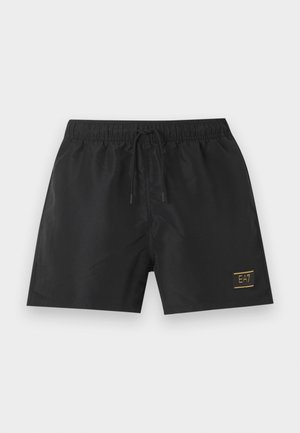 Shorts de bain noirs avec taille élastique, cordon de serrage à l'avant et petit logo doré EA7 sur la jambe inférieure gauche.