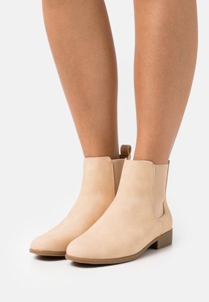 Korte laarzen - beige