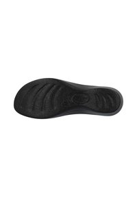 Soletta nera con superficie testurizzata, caratterizzata da scanalature per flessibilità e supporto, progettata per comfort e stabilità.