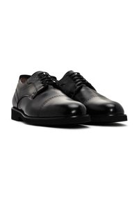 Chaussures habillées en cuir noir avec une finition polie, bout arrondi et un design classique à lacets. Présentent des détails de couture subtils et un talon bas.