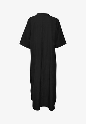 Sort, kortærmet kjole med afslappet pasform, ensfarvet texture og en sidelæg. Simpelt design, bagfra ses sømdetaljerne.